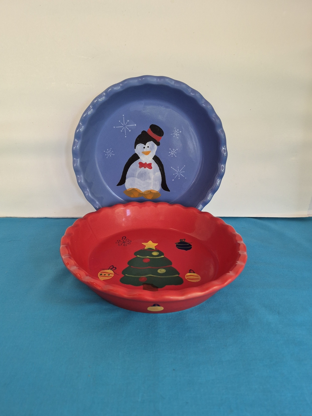 Penguin Christmas Tree Pie Plates Lot of 2 Stoneware Hand Painted 9” Diameter